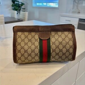 Vintage Gucci Sherry Line Clutch
Bag GG Parfums PVC Leather
Brown